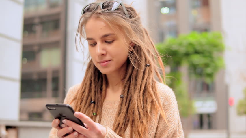 Caucasian Woman With Dreadlocks Chatting Stock Footage Video
