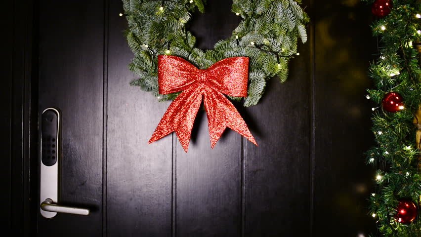 Wreath With A Big Red Bow Hangs On Front Door Next To Wreath With A Big Red Bow Hangs On Front Door Next To Knob