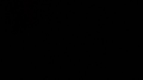 Fire ball explosion, high speed camera, isolated fire flame on black background, slow motion.