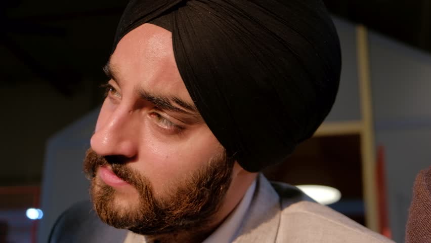 4k00 11close Up Portrait Of A A Busy Good Looking Sikh Handsome