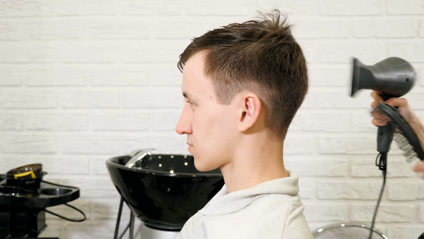 Male Hairdressing With Comb Drying Stock Footage Video 100