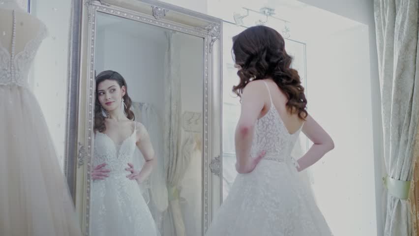 Beautifu Bride Choosing Wedding Dress Stockvideos Filmmaterial