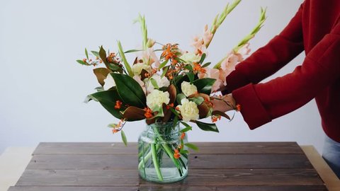 Female Florist Puts Flowers In Stock Footage Video 100 Royalty