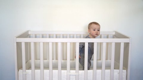 Baby Standing In A Crib Stock Footage Video 100 Royalty Free