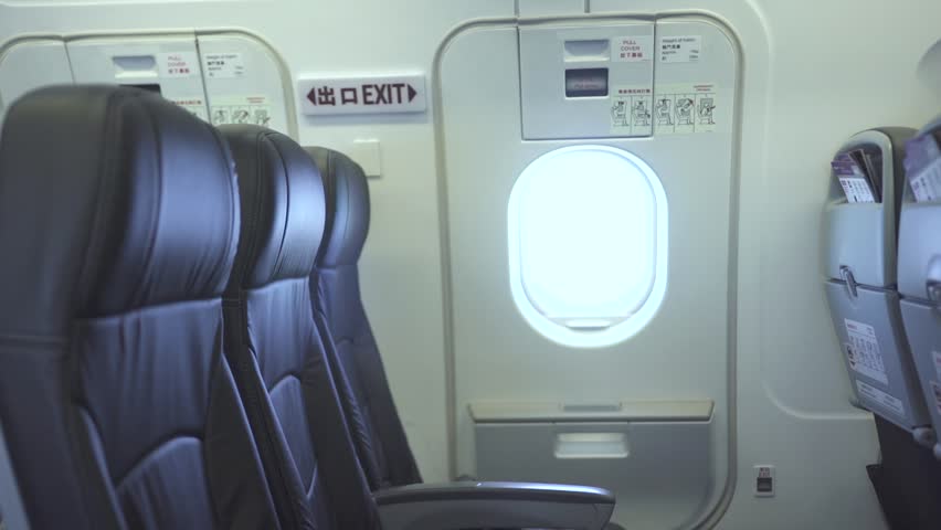 Airplane Emergency Exit Door Stock Video Footage 4k And Hd Video Clips Shutterstock