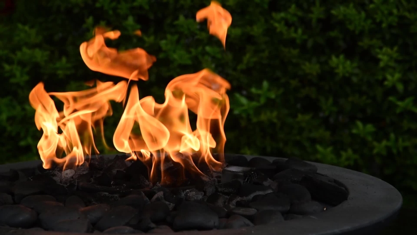 Flames Swaying In A Decorative Outdoor Fire Pit