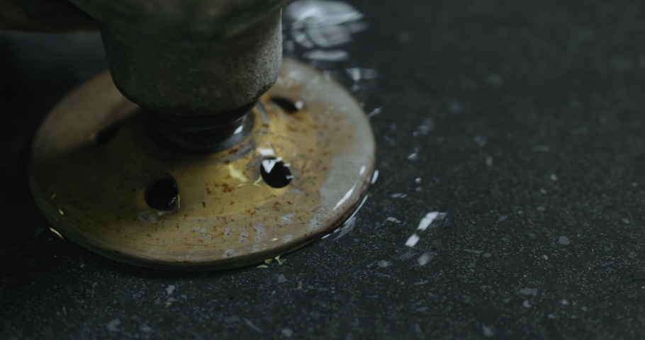 Slow Motion Handheld Wet Grinding Concrete Countertop