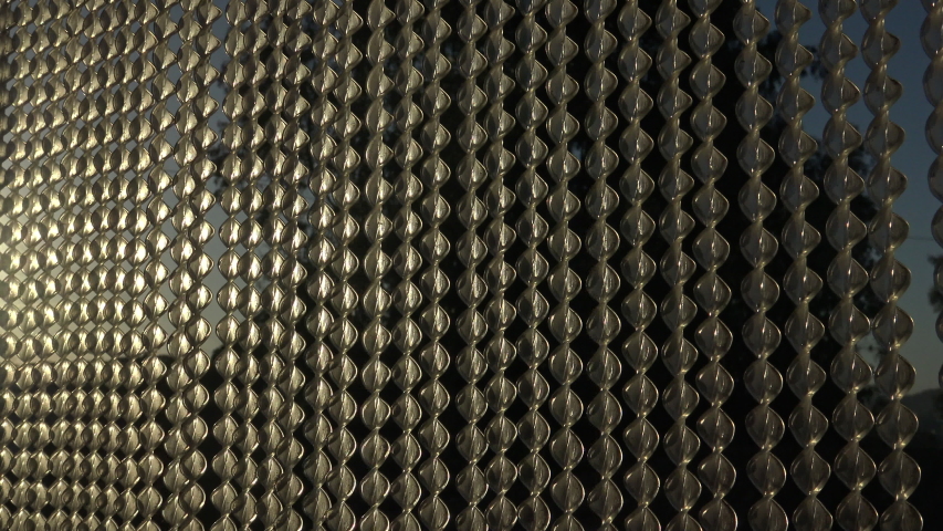 Shots Of A Anti Fly Curtain Made Of Plastic During Sunset