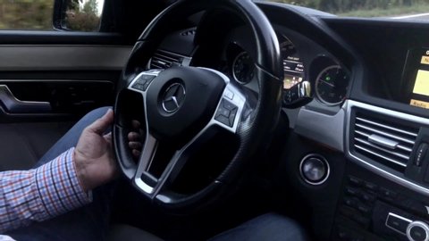 Zvolen Slovakia October 14th 2019 Business Man Drives Mercedes Benz E350 4matic On A Highway Closeup Of Person Hands On Steering Wheel And Driving Car Interior Dashboard View Of The Mercedes