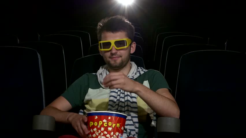 Image result for guy eating popcorn in cinema