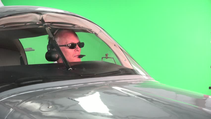 Stock video of pilot is flying airplane, green screen | 10897079 ...