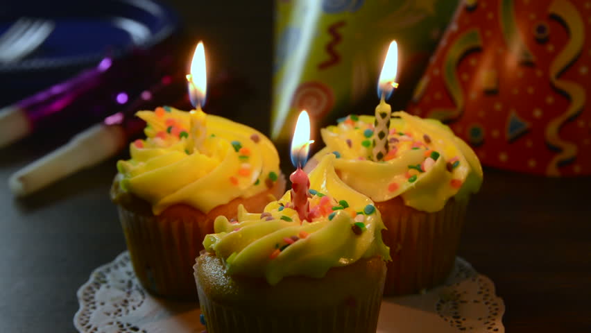 Three Birthday Cupcakes With Candles Stock Footage Video 100