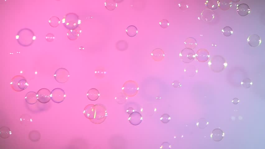 A Lot Of Soap Bubbles Isolated On Light Pink Background Stock Footage ...