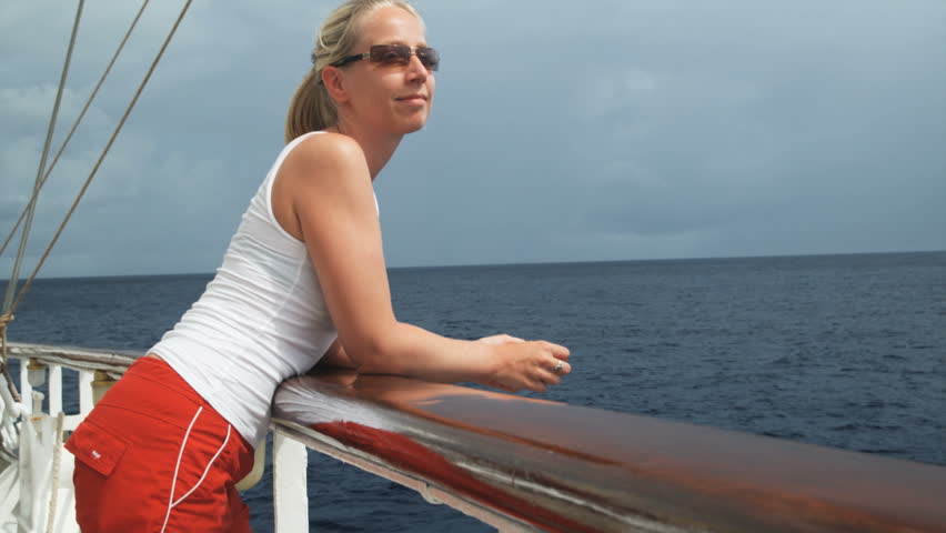 Image Of Sexy Legs Of A Young Woman In Marine Cruise Lying On The Deck Of Sailing Boat In Open