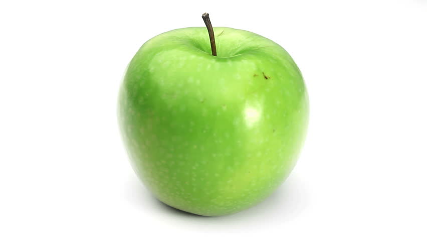 Closeup Of The Green Apple On The White Green Apple Turning On Itself Stock Footage 100