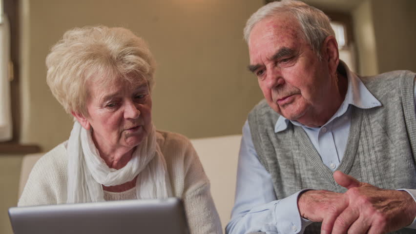 Elderly Couple Talking Each Other 4K. Old Wife And Husband On Sofa ...