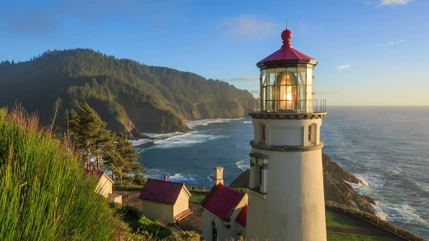 Along The Oregon Coast Stands The Heceta Head Lighthouse, Lit Up At ...