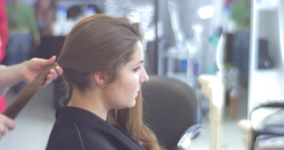 Stylist Hairdresser Is Making The Complicated Hairstyle Model