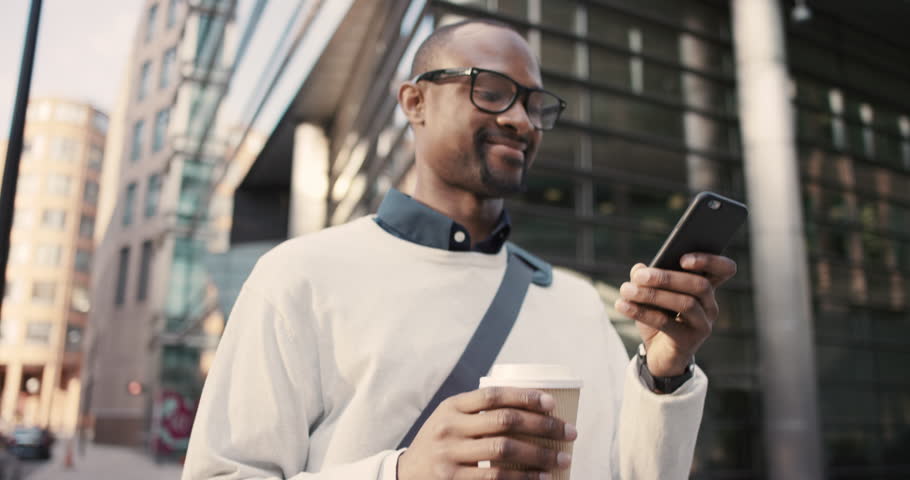 Image result for black person smiling using smartphone