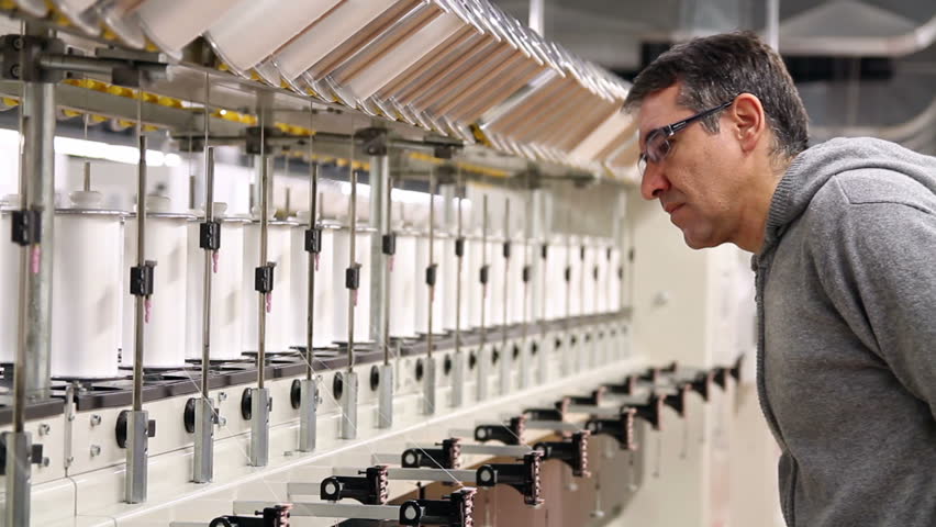 Textile Production Manager Working Inside Factory. Yarn Manufacturing ...