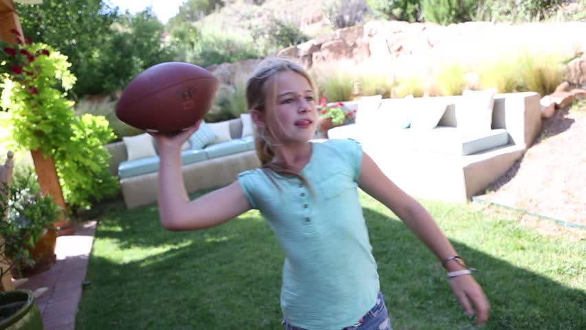 Videoclip De Preteen Girl Throwing Football Shutterstock