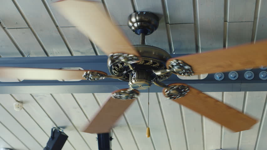 A Ceiling Fan Turns Slowly With Light Stock Footage Video 1967935 Fan Turns On The Ceiling Hd Stock Footage Clip