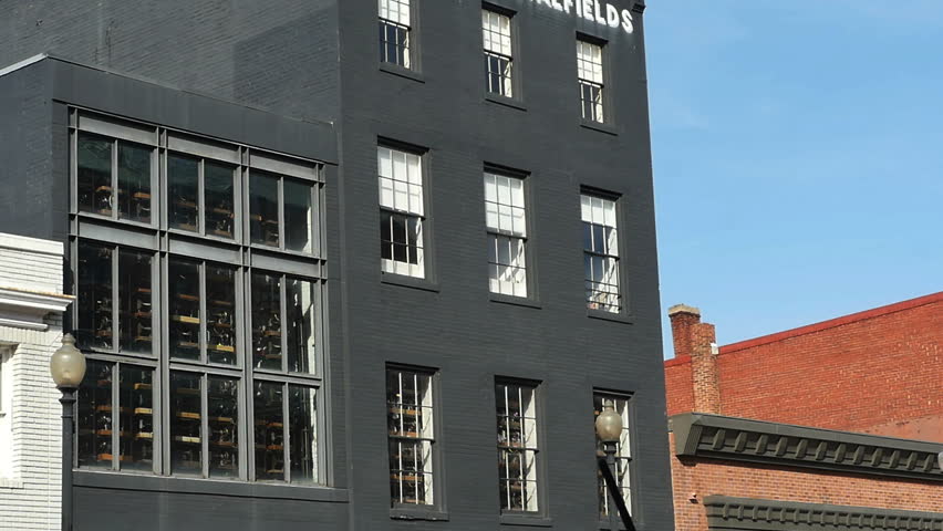Stock video of apartment building painted black on city | 15168289
