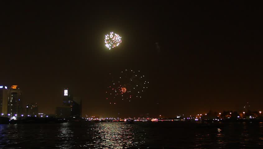 Stock video of fireworks explosion in dark night sky 