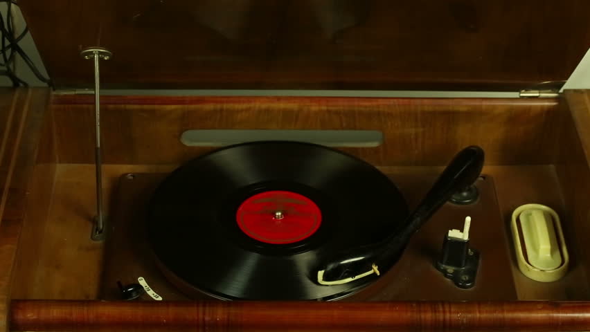 Vinyl Record Pleer. Plays Song From An Old Turntable 4k Top View. Black ...