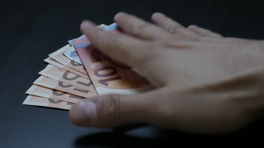 Human Hand Taking Euro Currency Stock Footage Video 100 Royalty Human Hand Taking Euro Currency Debts Or Deposits From Table Slow Mo 1080p Hd Video Motion Of European Union Paper Money Wad