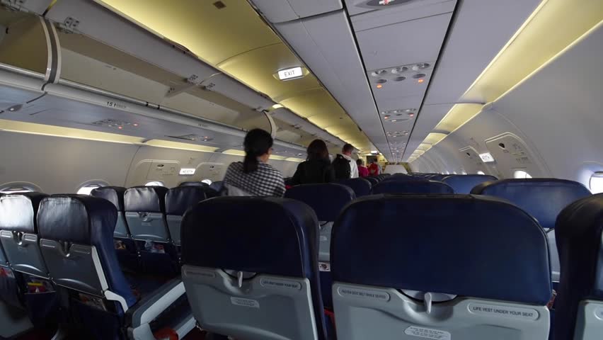 Inside Airplane. Passengers Siting In Plane. Air Travel. Flight Flying ...