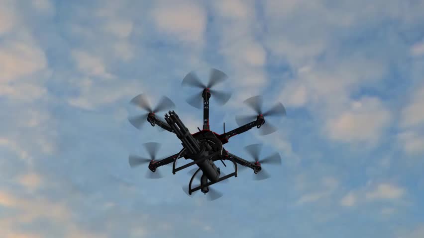 Drone Hexacopter Armed With Minigun Flying In The Sky Stock Footage ...