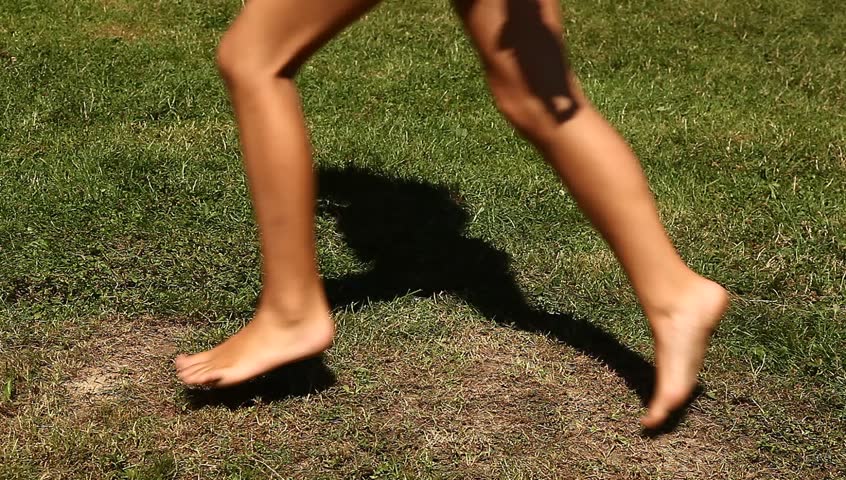 Sport Feet Gentle And Timid Female Jogging Women Running On The Grass