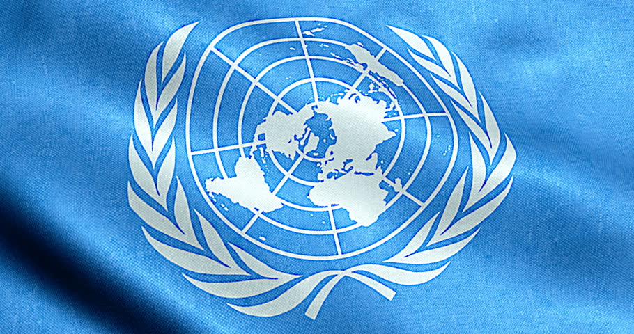 United Nations Organization Flag Waving In Slow Motion Against Blue Sky ...
