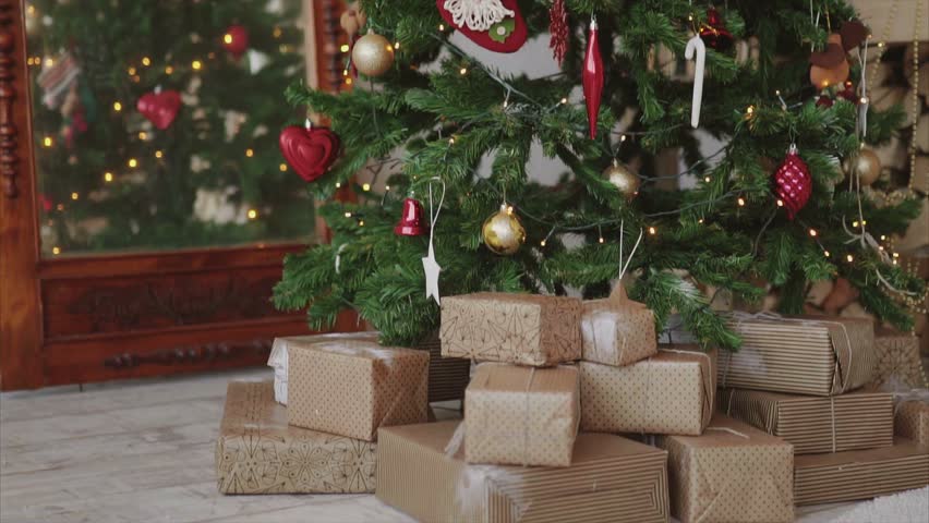 Close Up Shot Of Christmas Presents And Gifts Under New Year Tree HD