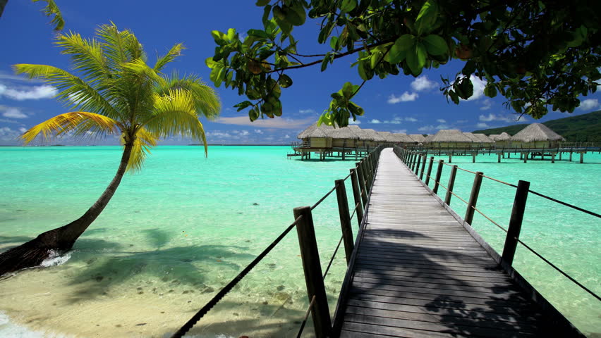 Overwater Boardwalk Luxury Bungalows In Tropical Aquamarine Lagoon ...