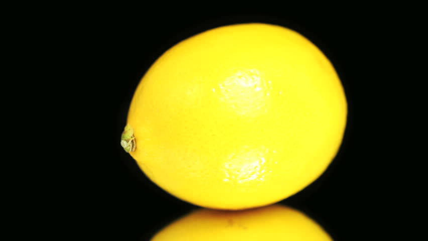 Bright Yellow Ripe Lemon Rotating Slowly On Black Background Bright Yellow Ripe Lemon Rotating Slowly On Black Background Seamless Loop