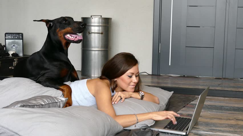 Image result for doberman dog, in the laptop