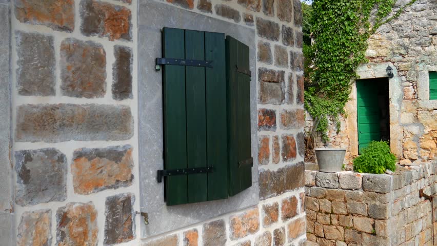 Green Window Shutters The Facade Of Houses In Montenegro Green Window Shutters The Facade Of Houses In Montenegro