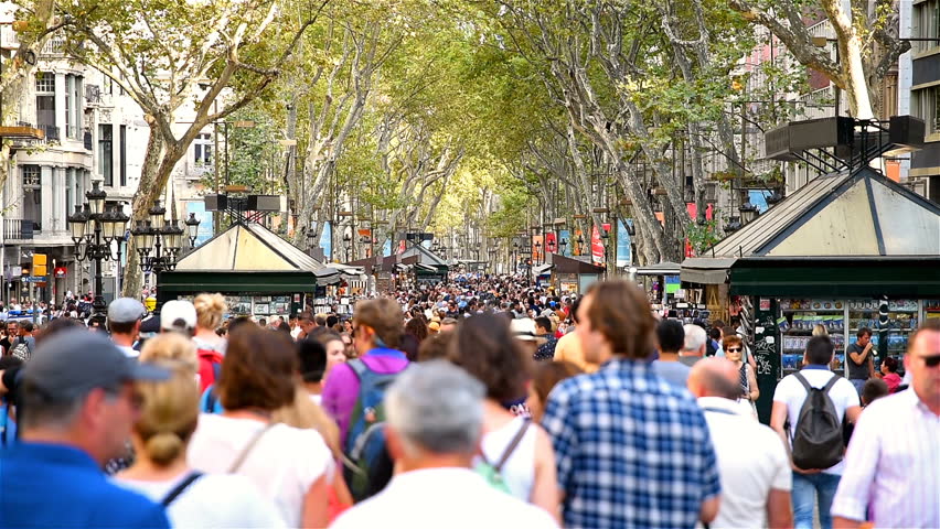 People Walking Background In Barcelona, La Rambla. Pedestrians Walking ...