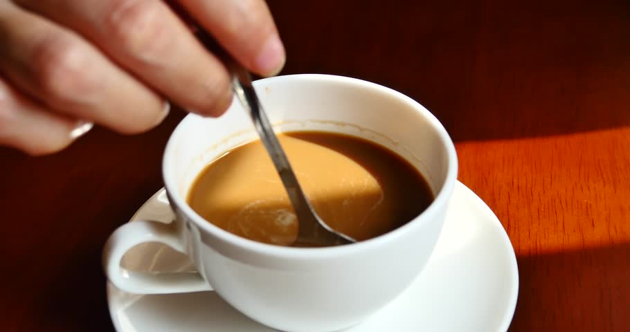 4k Female Stir the Coffee. Stock Footage Video (100