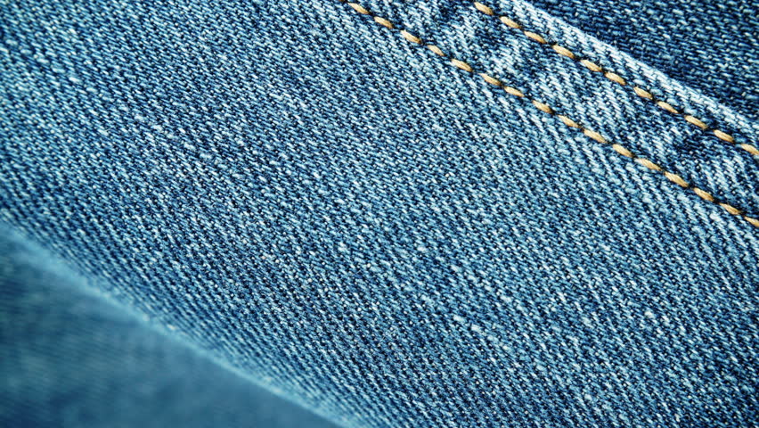 Closeup Detail Of Blue Denim Jeans, Texture Background. Dolly Sliding ...