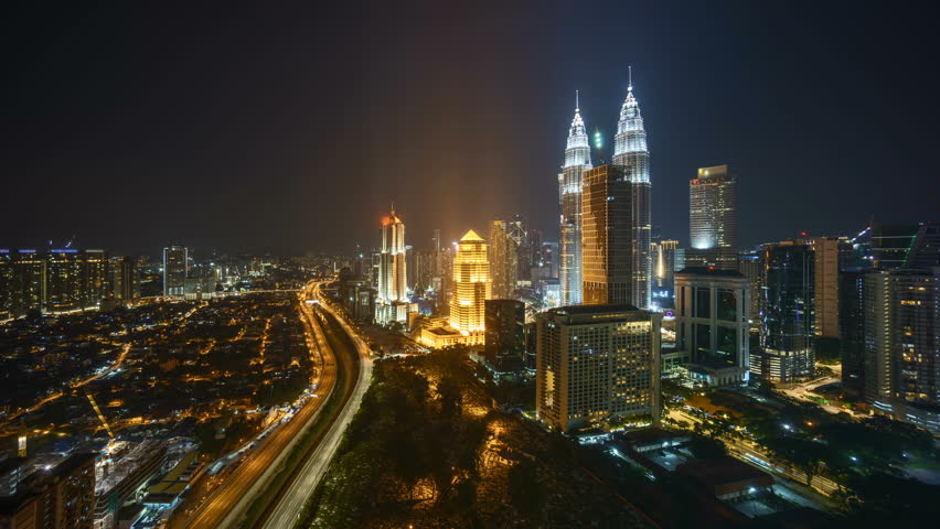 Nightscape Cloudy Time Lapse Of Kuala Lumpur City Skyline. Pan Right ...