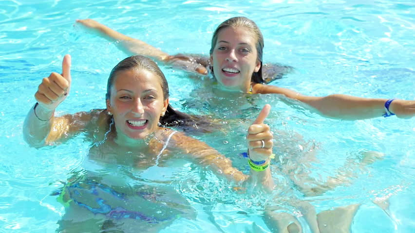 Woman Floating In The Swimming Pool In Slow Motion Stock Footage Video ...