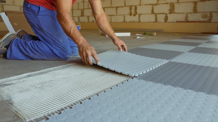 Laying Rubber Floor Tiles Stock Footage Video 100 Royalty Free