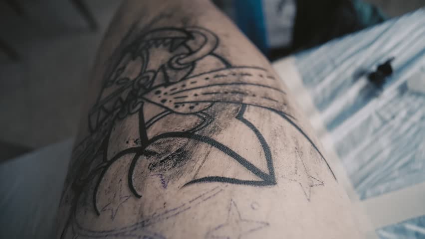 telford england january 24 tattoo artist working on elaborate telford england january 24 tattoo artist working on elaborate