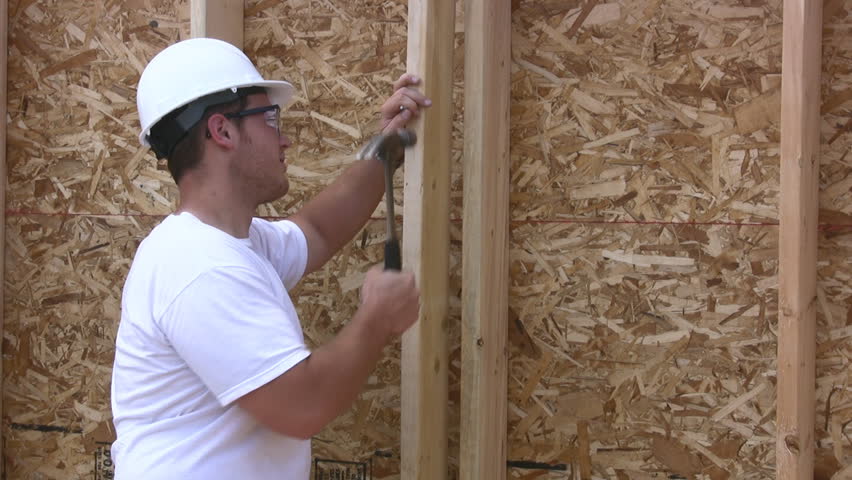 Construction Worker Building House Stock Footage Video (100% Royalty