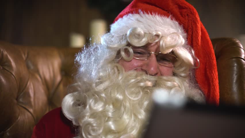 Santa Claus In Spectacles Glasses Or Spectacles And White Beard Reading ...