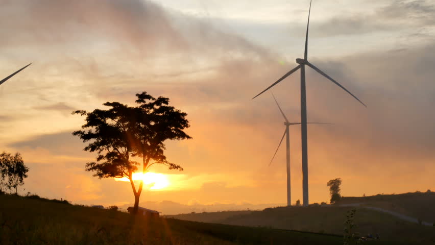 Close Up Of Wind Turbine During The Sunset. Atmospheric 