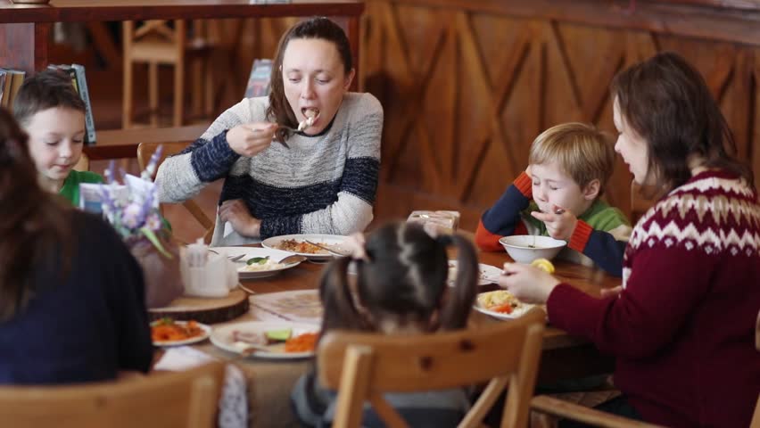 School Food - A Group Of Elementary School Children Eating A School ...